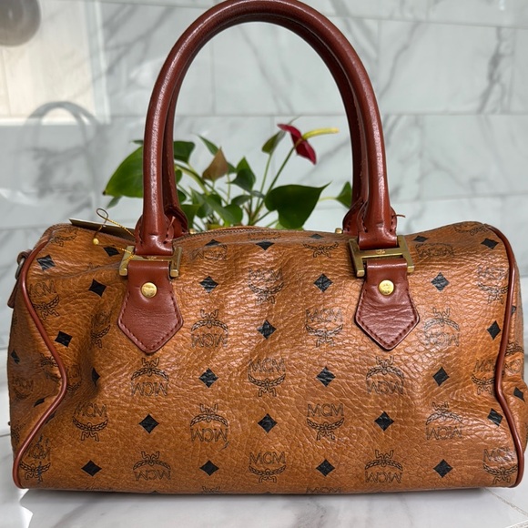 Authentic MCM Brown Hand Bag with Signature Logo and Gold Hardware - Picture 4 of 17